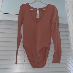 Forever 21 pink bodysuit, size S.